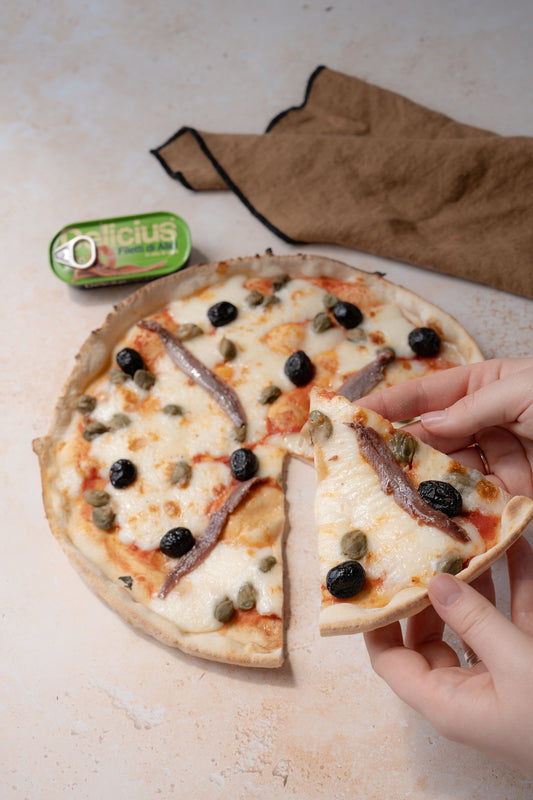 L'anchois sur la pizza origine et histoire d'un ingrédient controver